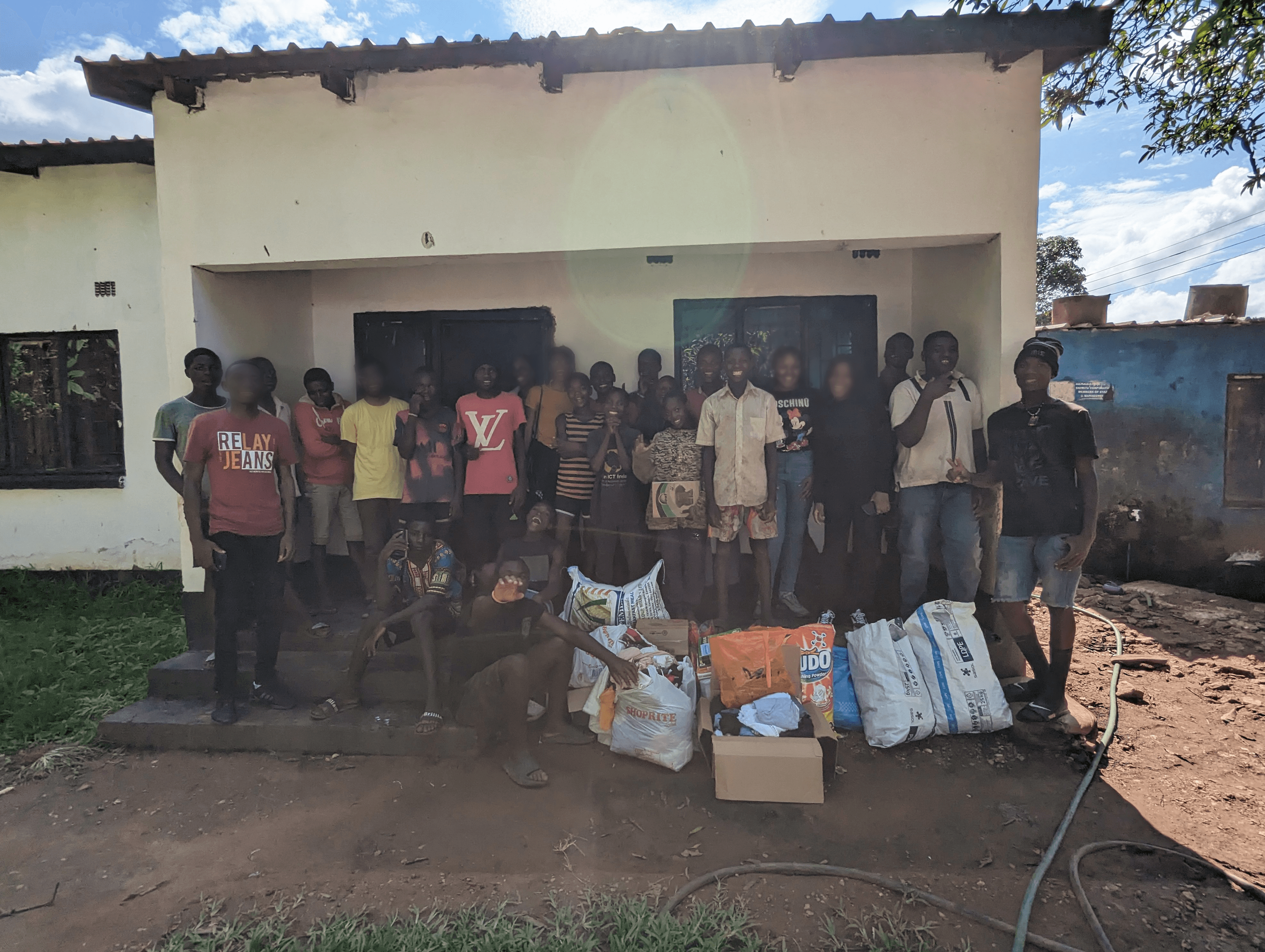 A farewell group photo with everyone from Nsansa Village